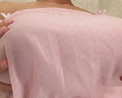 The pink cloth is being held by someone named Jenny McClain.
