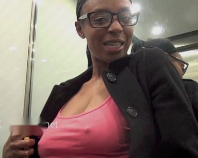 Black whore Flashing Breasts Outdoors