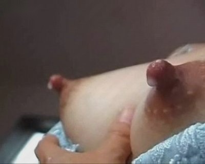 Leche Mamma 5 Naked babe with erect nipples.