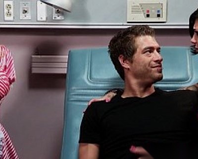 A slut is laying on a bed with a fucker named Rilynn Rae.
