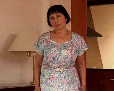 Elderly slut shows off her flowery dress