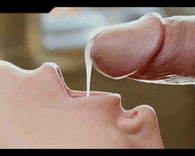 A slut sits with her mouth open while a fucker squirts milk onto her face. Flockofseagulls