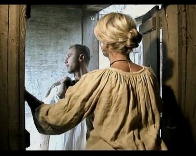 A whore fixing her hair while another male looks at himself Xtime Club