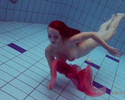 redhead in the pool
