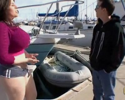 Blond bimbo wearing tight shorts talks to fucker on boat