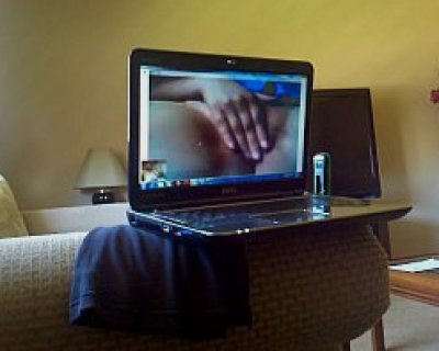Naked male on laptop screen