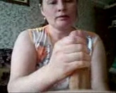 whore holding wooden object Nnatali