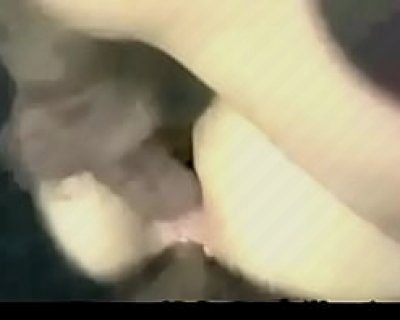 An arm and a bare tits. This is a close up.