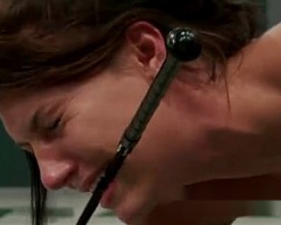 A girl is screaming. A tethered microphone is attached to her neck.