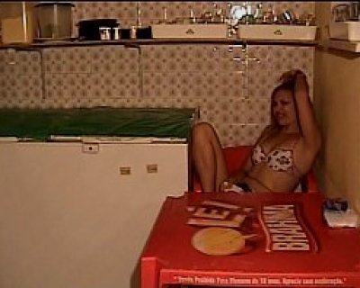 A bimbo is laying in a bed with Pippo Bar on it.