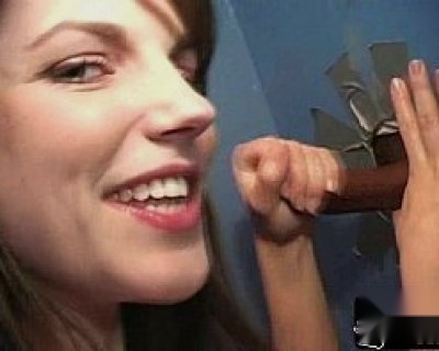 slut holding a metal bat. Smiling. In close-up.