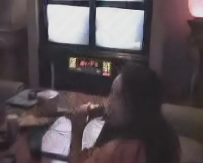Watching TV with an Asian whore.