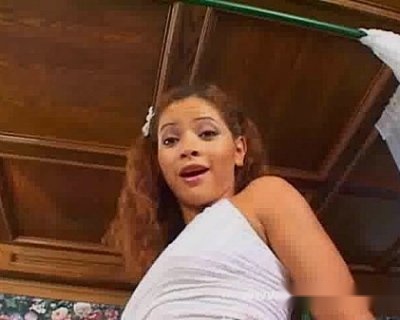A bimbo posing for the picture. The picture is from the top of her head.