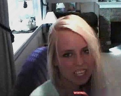 A slut's face with scary teeth and lipstick smudge.