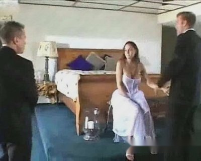 The whore is sitting on the bed. Wedding Night.
