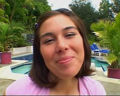 A girl named Ashley Blue is posing for the camera.