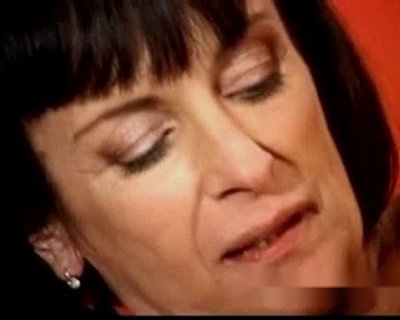 Mature whore Looking at Camera