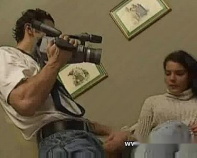 man is filming the girl