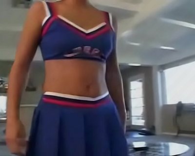 whore in blue skirt. The right arm is on the wall in front of her.