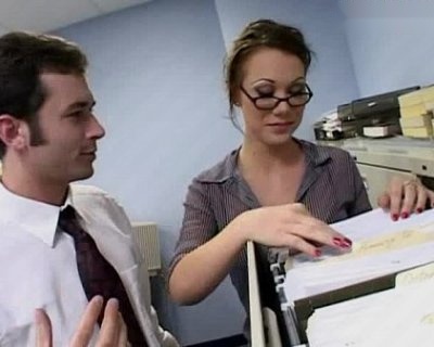 whore is putting papers in a folder. What she is doing is important.